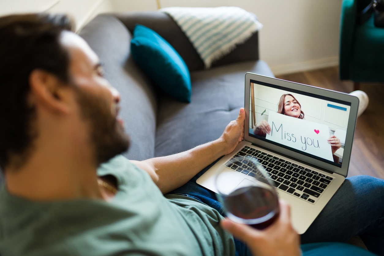 Happy couple on a long-distance relationship missing each other.